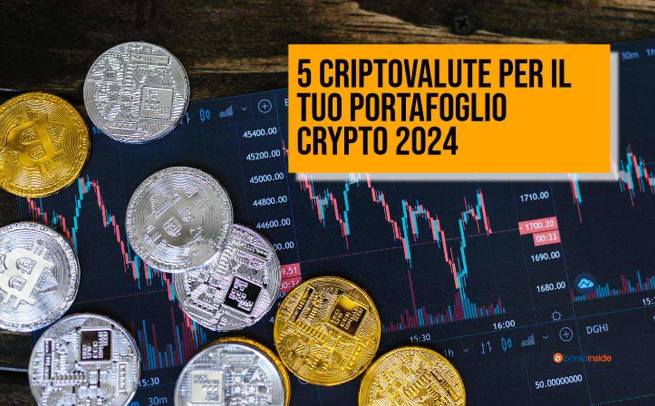 alcune monete di criptovalute e dei grafici che indicano l'andamento del prezzo