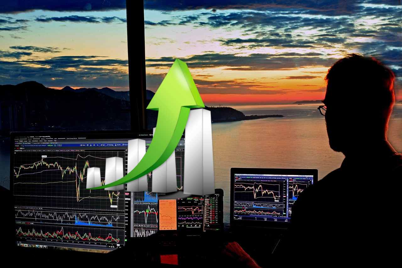 trader con chart room al tramonto