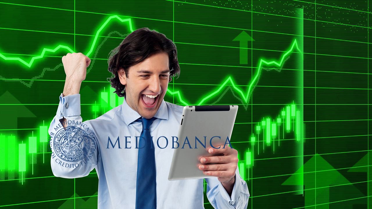 trader euforico con logo di Mediobanca