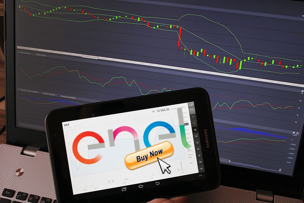 tablet con grafico di trading e logo di Enel