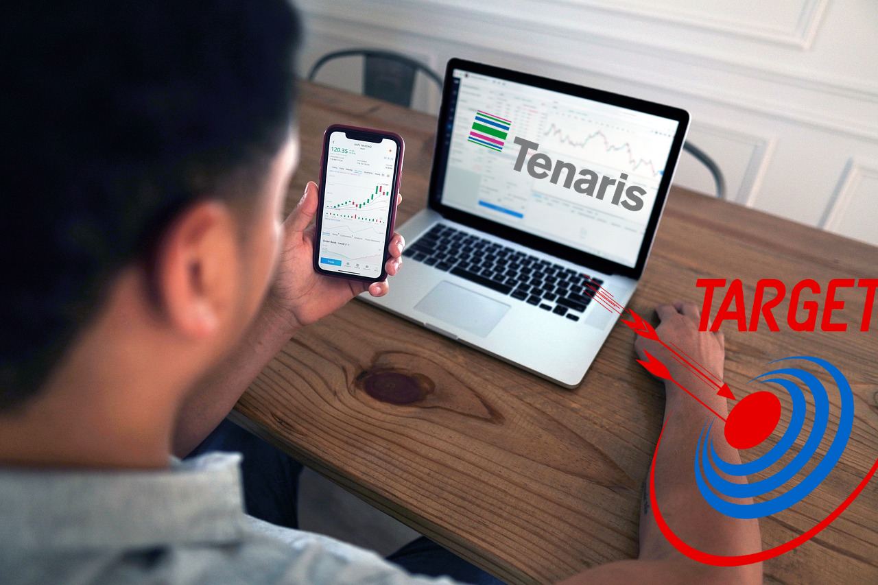 trader in azione e logo di Tenaris su laptop