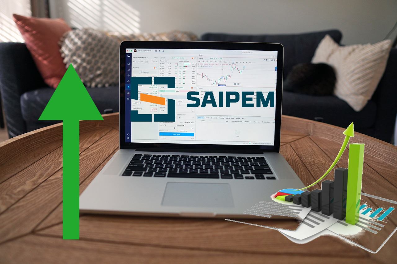 logo di Saipem su un laptop e grafico al rialzo