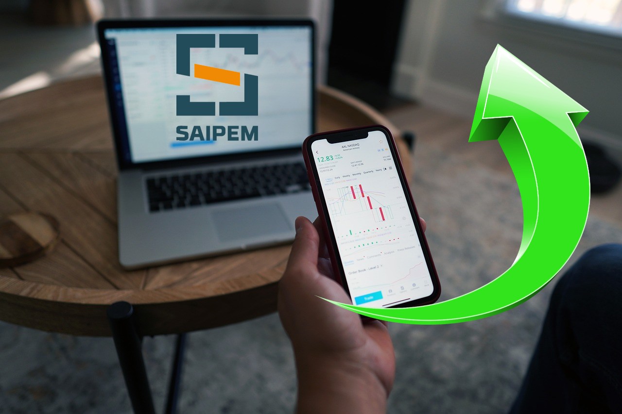laptop con logo di Saipem e mobile trading