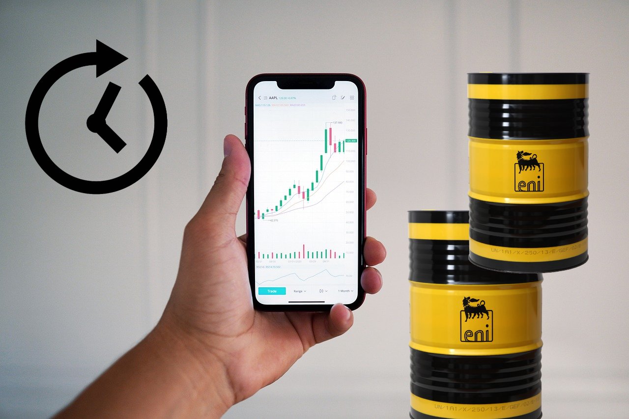 mobile trading e due barili di petrolio con logo Eni