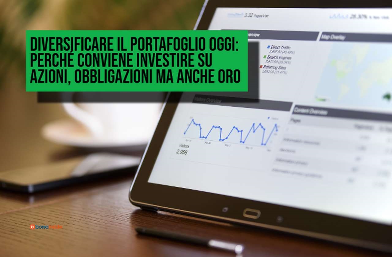 Un tablet con alcuni grafici finanziari su una scrivania