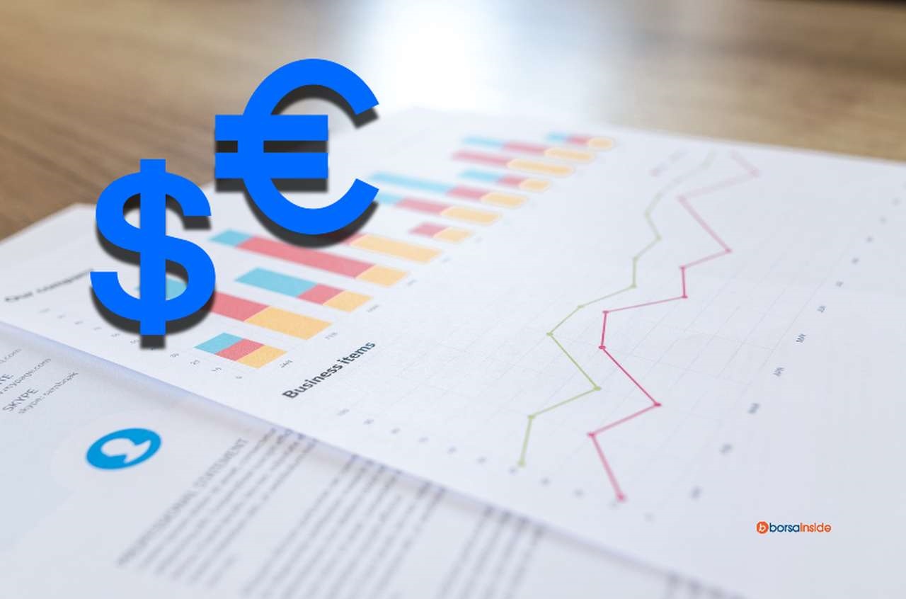 Delle carte con dei grafici finanziari e i simboli di euro e dollaro in sovrimpressione