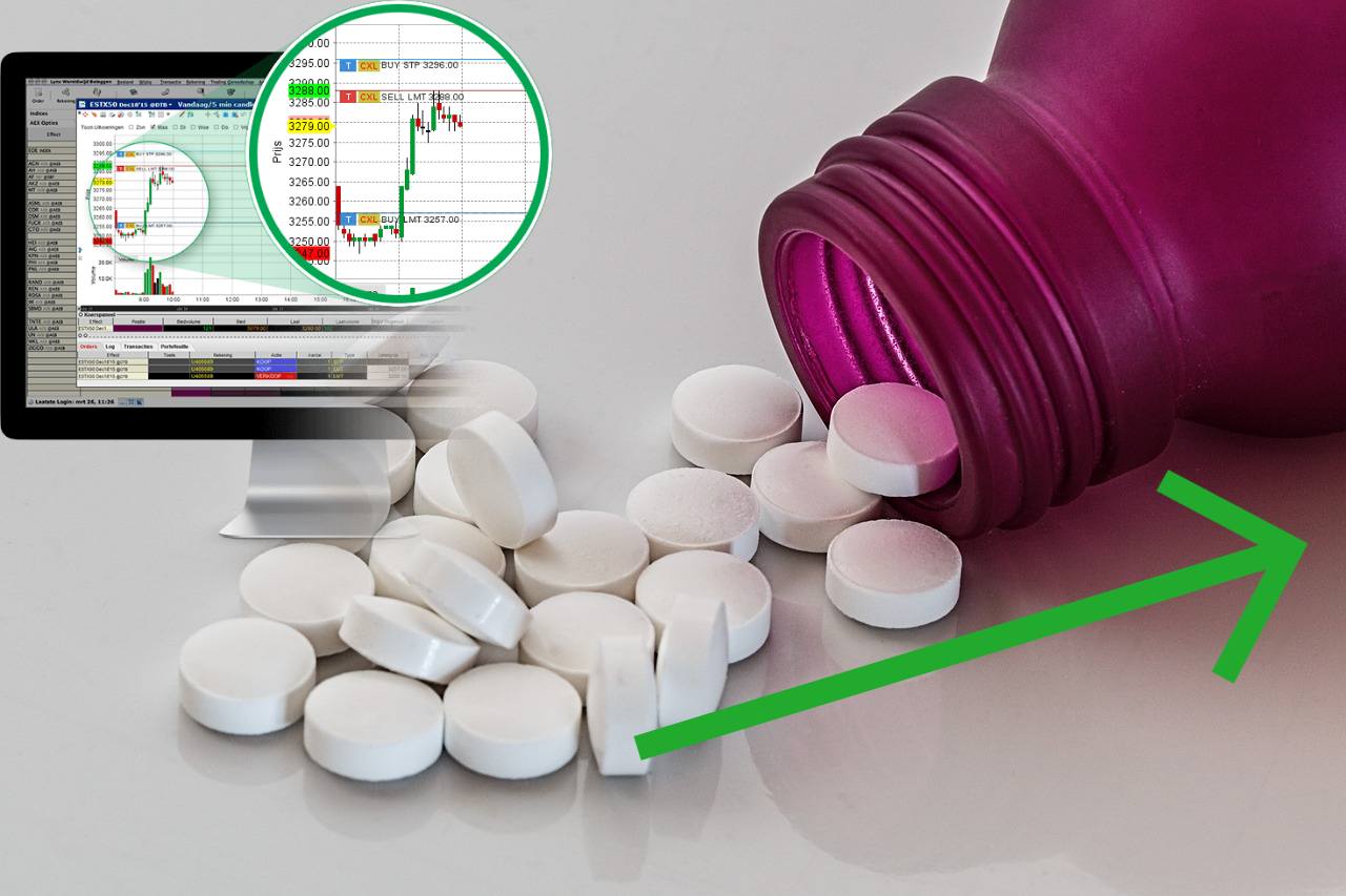 pillole e grafico di borsa