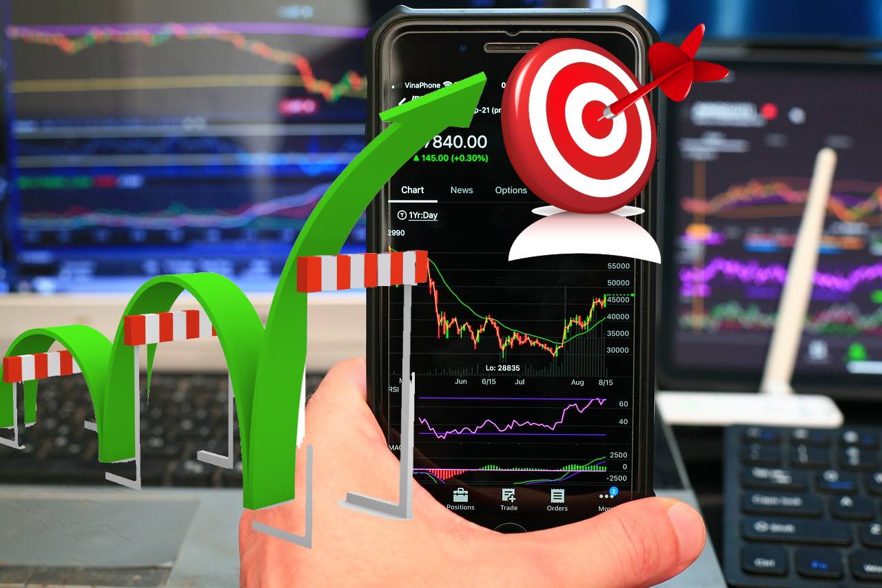 mobile trading e grafico al rialzo con obiettivo