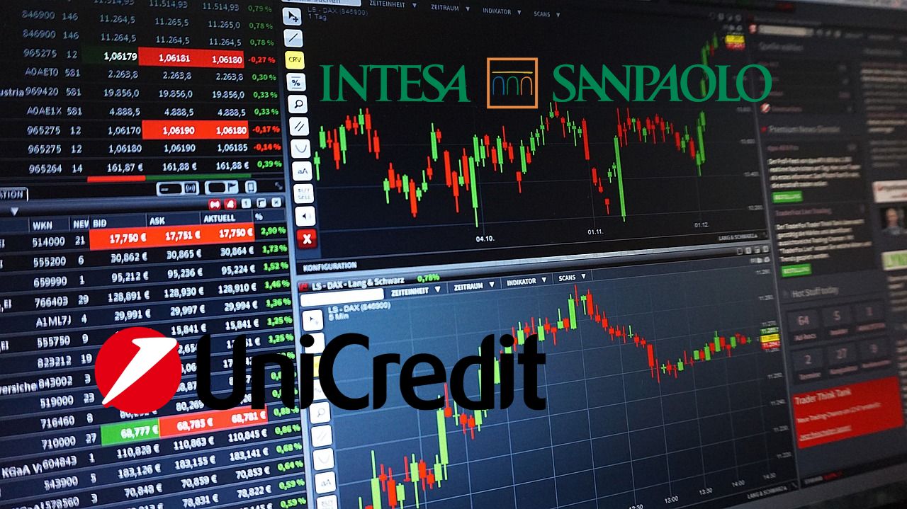 logo di Unicredit e Intesa Sanpaolo con sullo sfondo una chart di trading