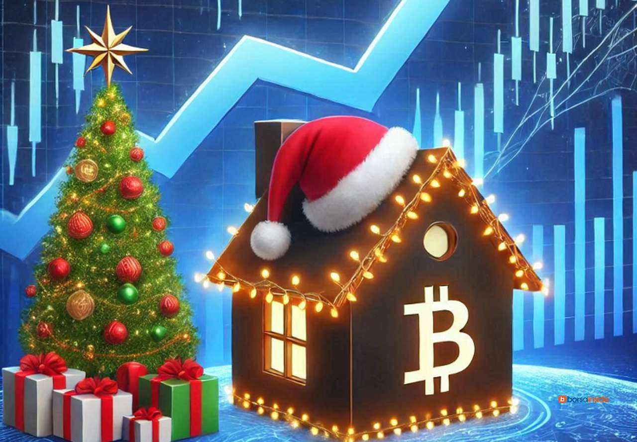 Un albero di natale e una casetta con il logo di Bitcoin e un cappello da Babbo Natale sopra. Sullo sfondo dei grafici finanziari luminosi