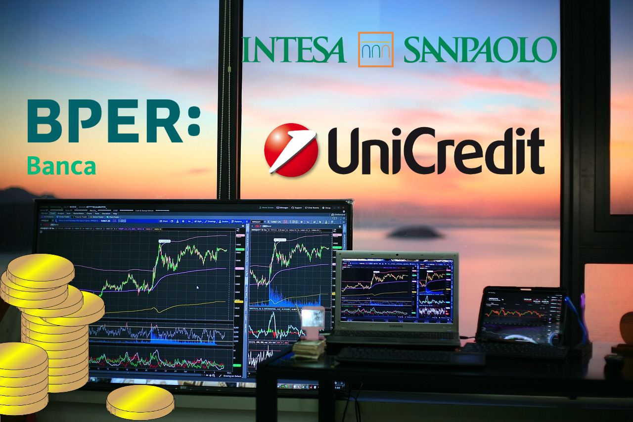 loghi di Unicredit, BPER Banca e Intesa Sanpaolo con davanti chart di trading