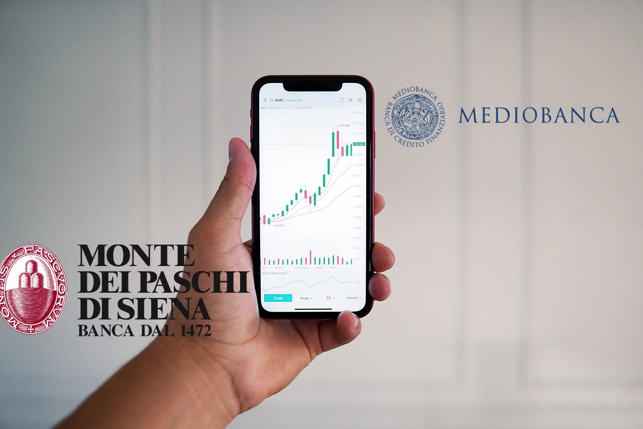 loghi di Mediobanca e MPS con mobile trading